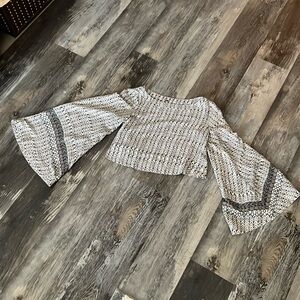 Free People cropped bell sleeve top.